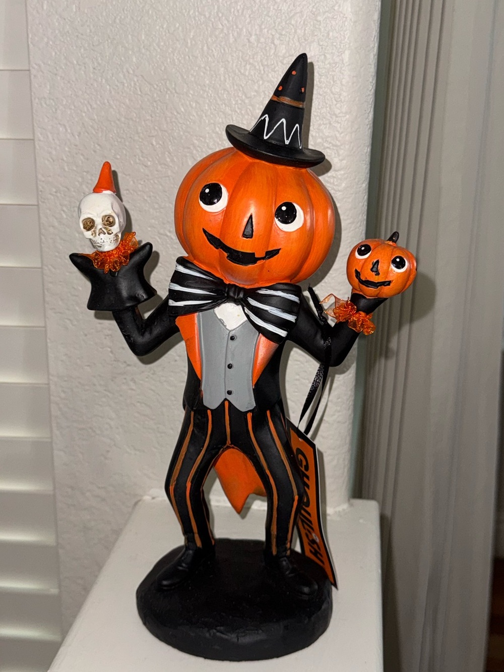 Vintage Ghoulish Boy Pumpki Figurine with Orange Accents - Festive Holiday Decor
